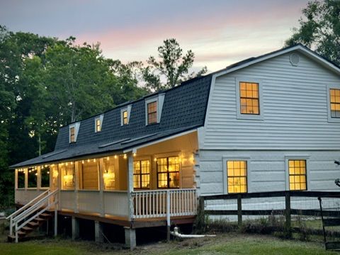 Farmhouse-style home at dusk near Green Cove Springs
